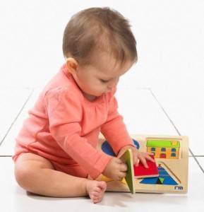 baby-playing-with-toys