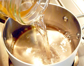pouring-vinegar-into-milk