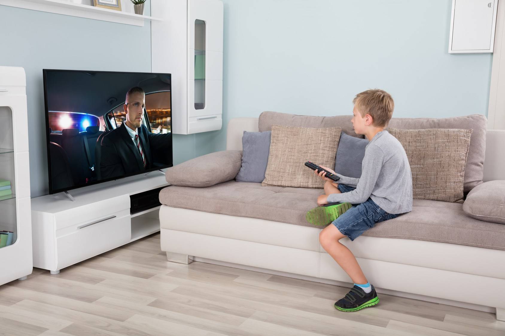 Boy Watching Tv In Living Room