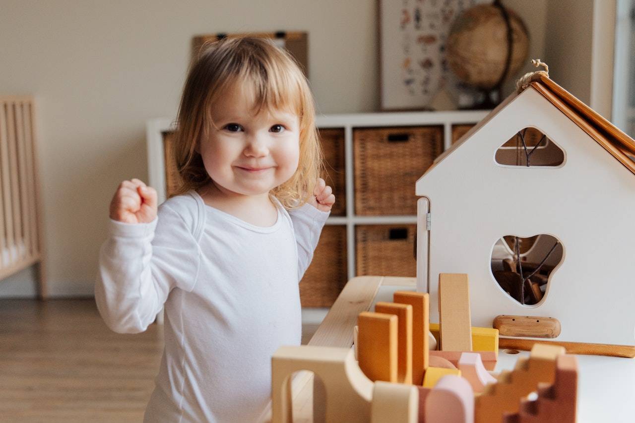 Happy Kid in her Bedroom