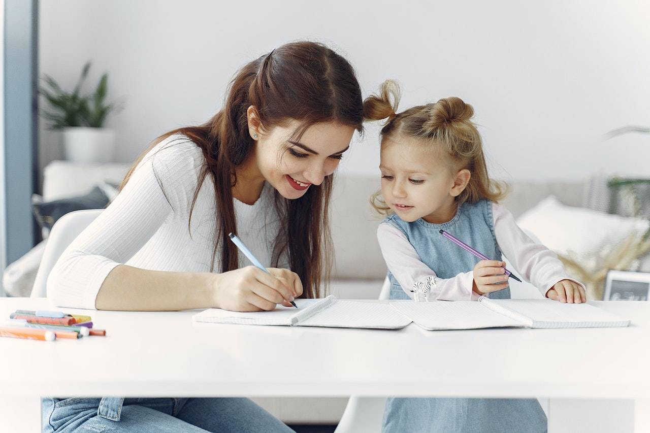 Mom teaching child writing kids world fun blog