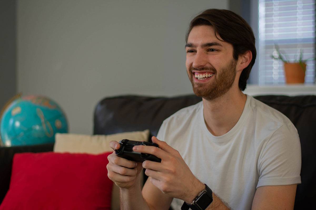 Stress free man playing game