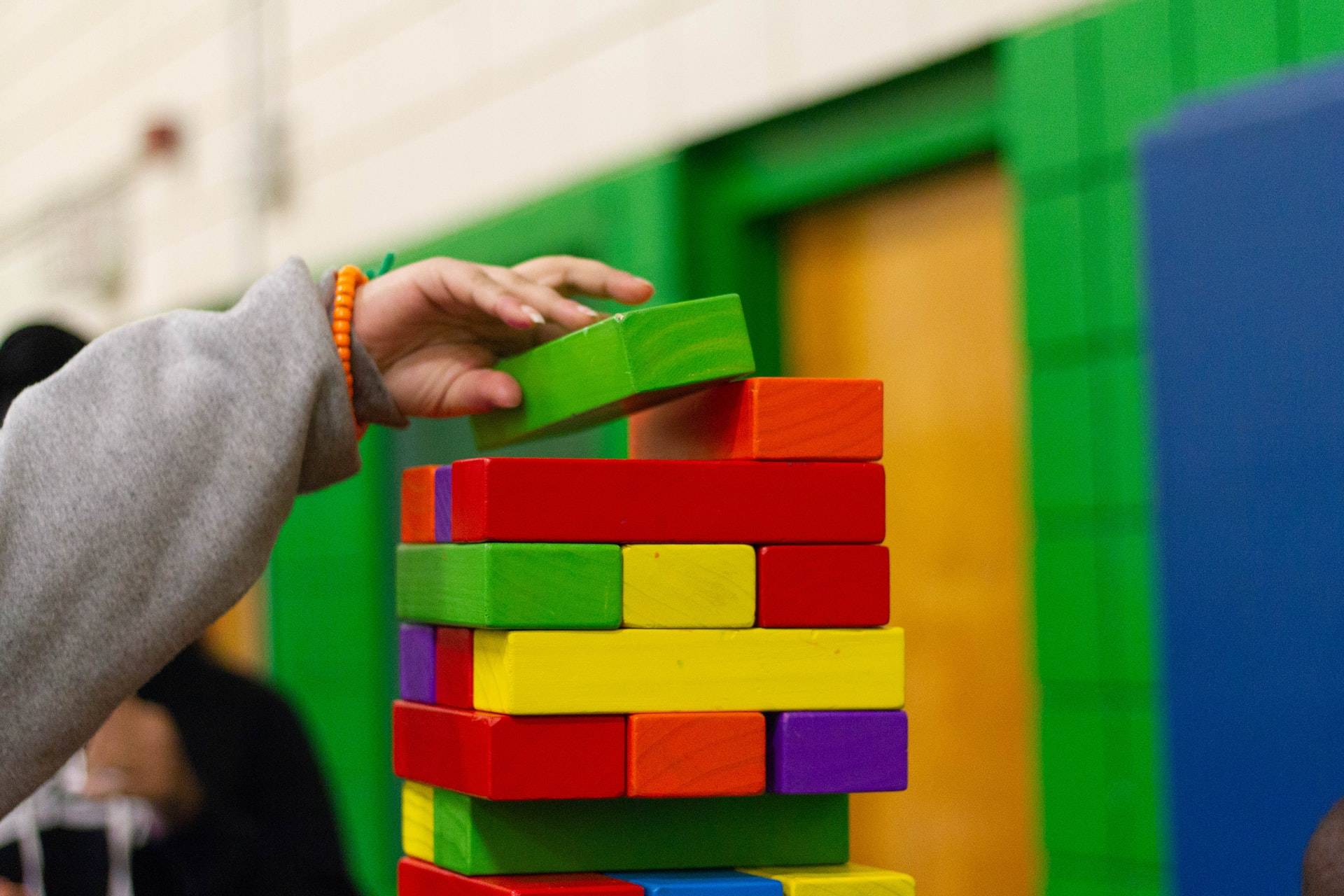 Person piling blocks