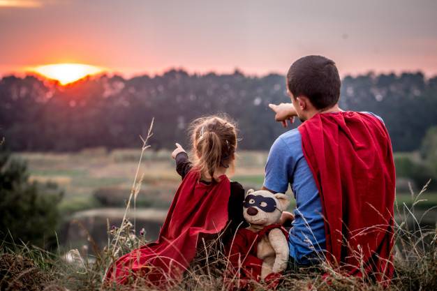 little girl with dad dressed super heroes happy loving family
