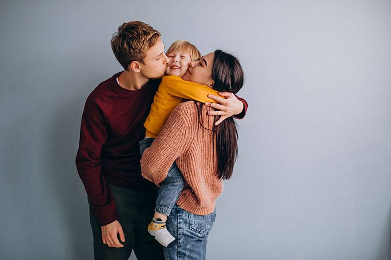 Young family with little son