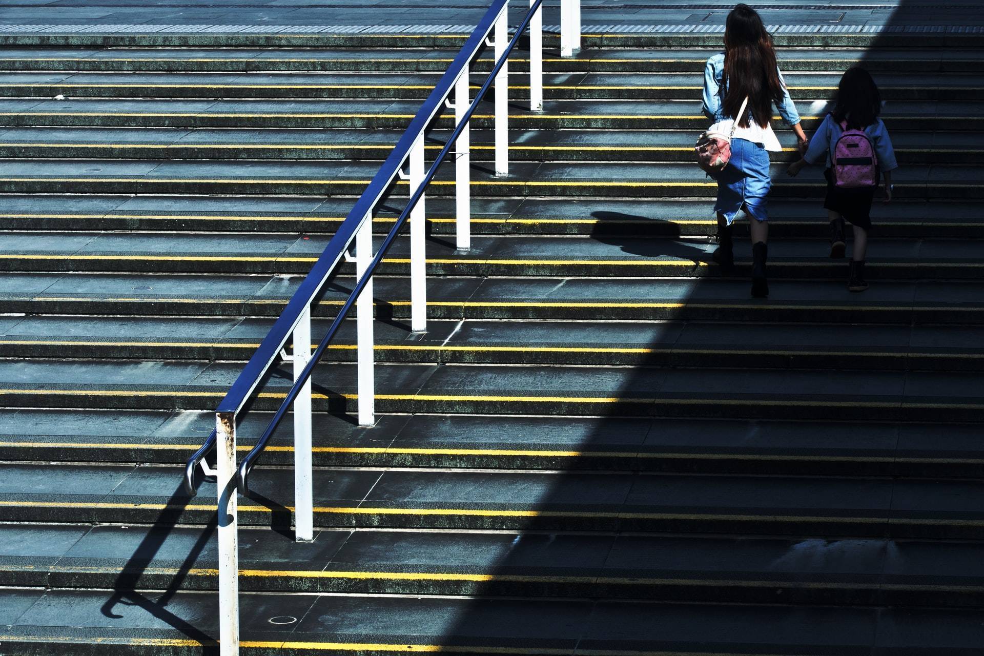 Student Stepping Up the Education Staircase