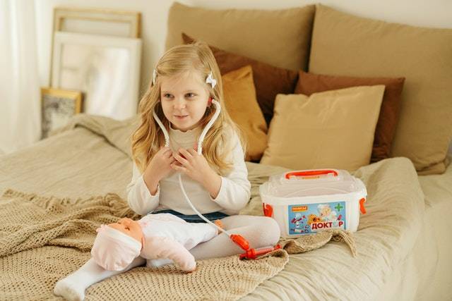 Baby Playing With Doll Toys