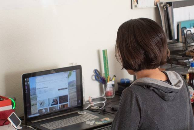 Teenage Child Using Computer
