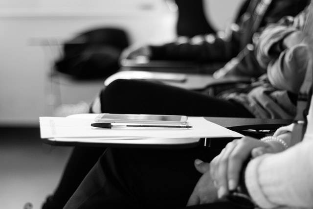Mobile and Pen - Children at Classroom