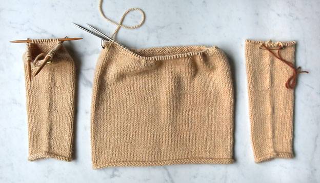 joining sleeve pieces of a sweater
