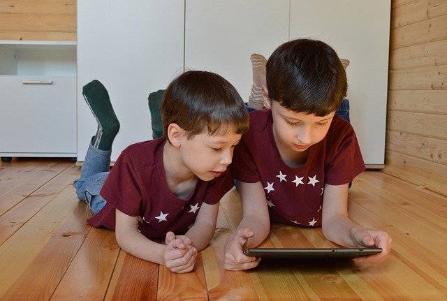 Children Reading Audiobooks In Gadget Tablet