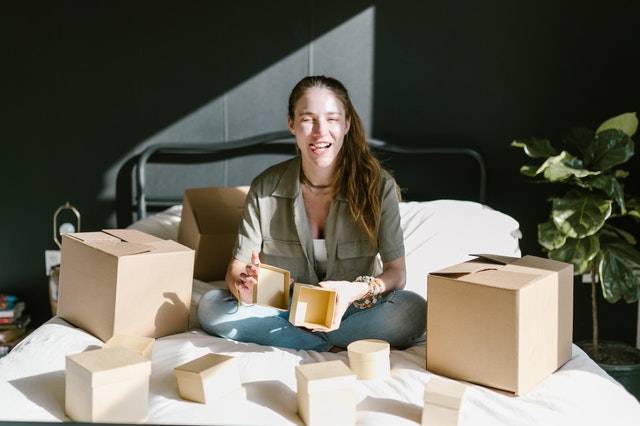 Preserve Child Keepsakes, Packing, Smiling Lady