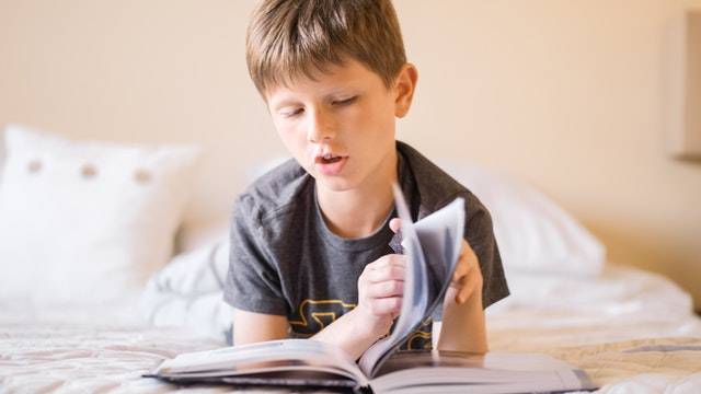 Boy Child Reading Book