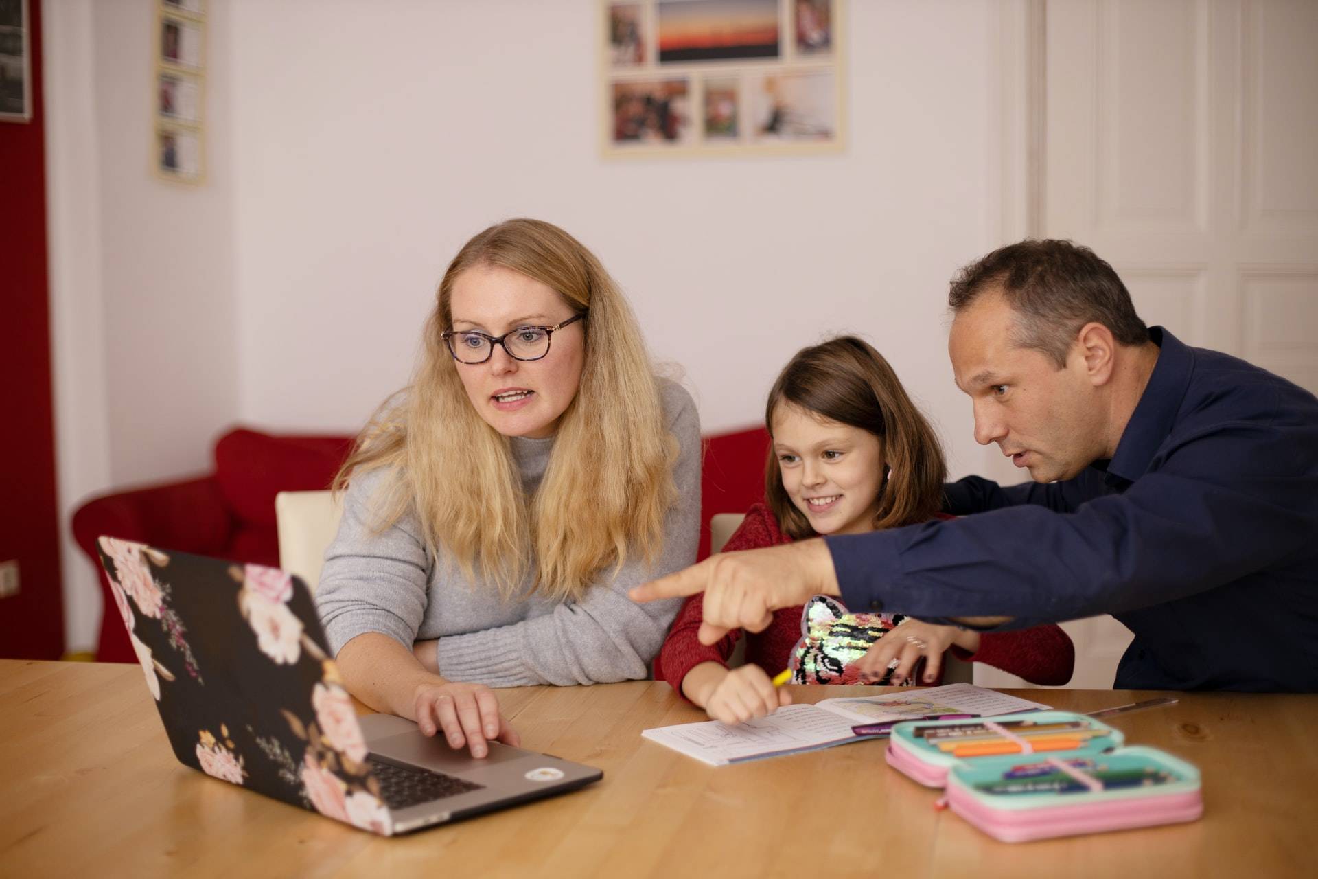 Parent with Child looking at Laptop