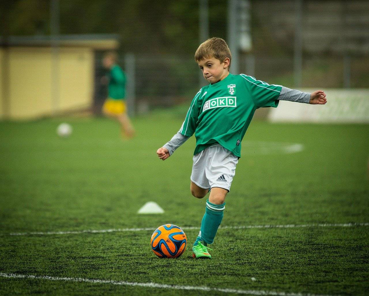 Football Playing Child